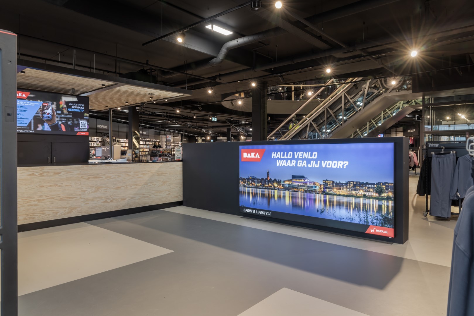 Inside the Daka Sport Venlo store — 3,000 square metres of sports and lifestyle retail with the Daka branding front and centre. Photo: WSB Interieurbouw